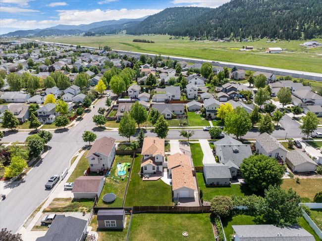 Aerial perspective of suburban area with a mountainous background | Image 42