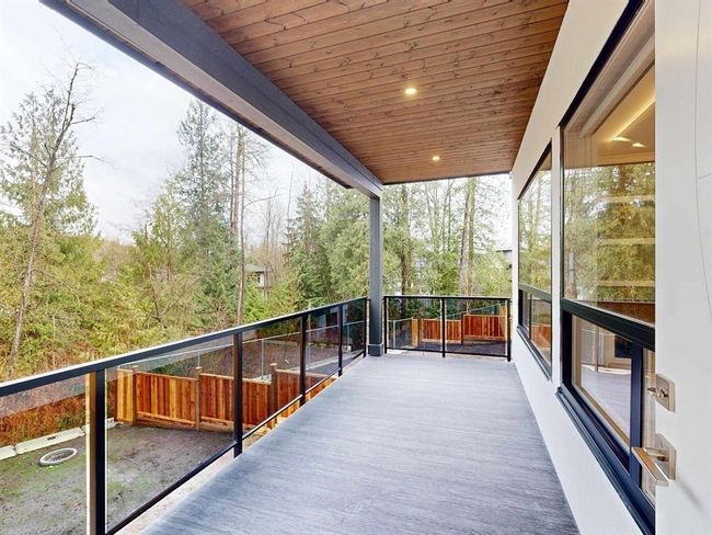 View of unfurnished sunroom | Image 18