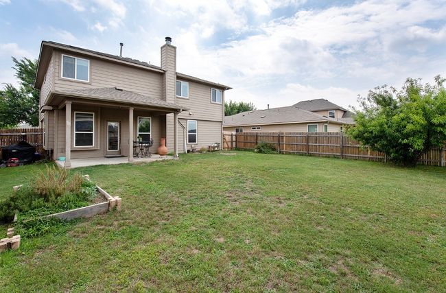 Back of property with a patio and a chimney | Image 26