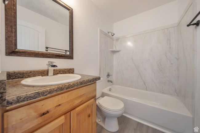Full bathroom featuring bathing tub / shower combination | Image 21