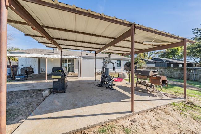 View of patio featuring a grill | Image 5