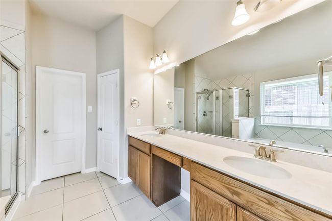 primary bath with vanity and dual sinks | Image 17