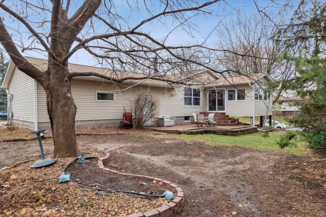 spacious backyard with ample room for entertaining friends and family | Image 24