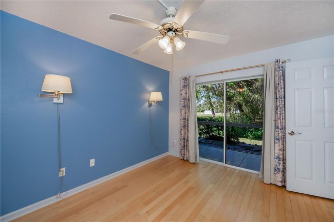 primary bedroom with slider | Image 4