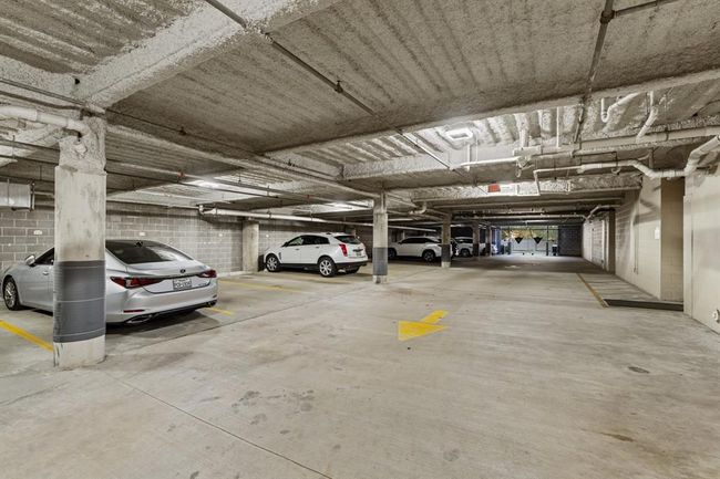 Two assigned parking and an enclosed storage room at the garage level. | Image 40
