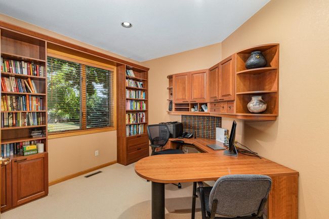 The main floor den office has views to the front to see who is coming! | Image 19