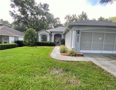 9288 Sw 192 Court Road, House other with 3 bedrooms, 2 bathrooms and 2 parking in Dunnellon FL | Image 2