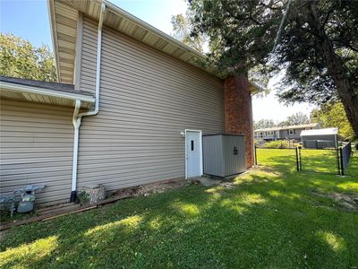 View of side of home with a yard | Image 3