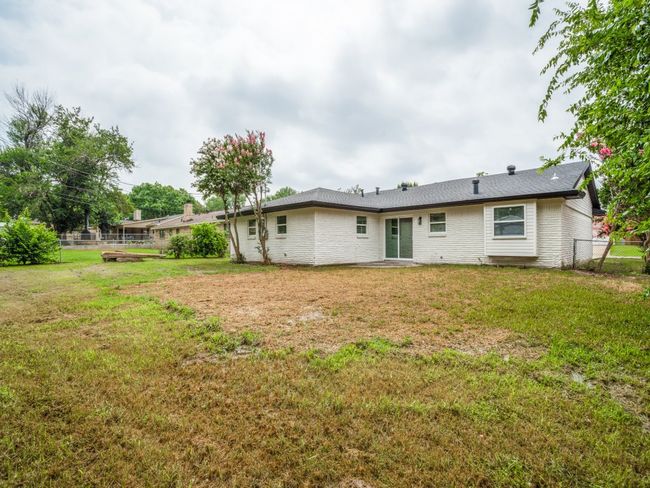 Rear view of house featuring brick siding | Image 15
