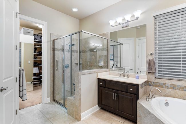 Primary Bath Features Garden Tub, Walk-In Shower and Dual Vanities | Image 23