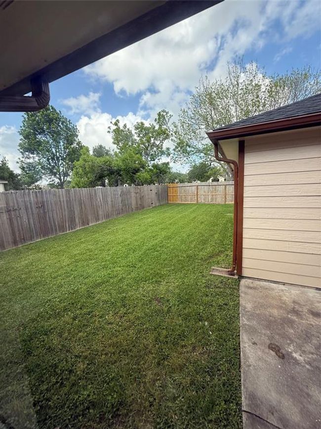 view of backyard from the back door | Image 24