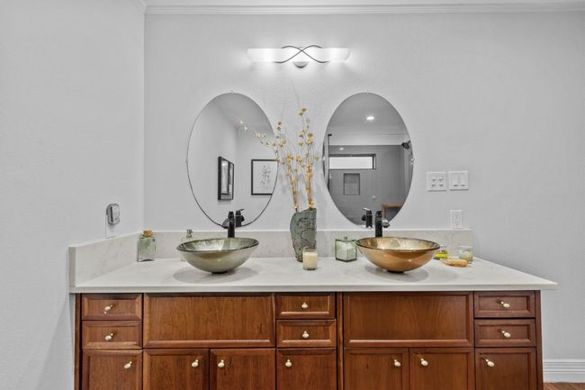 MAIN: Primary bathroom has double vanity | Image 15