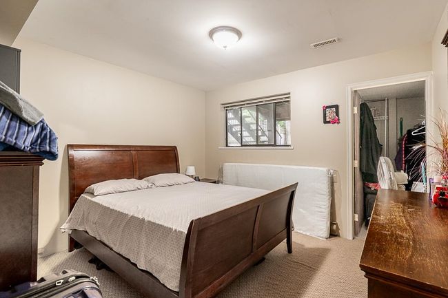 Bedroom with carpet flooring | Image 24