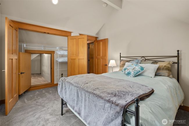 Bedroom upstairs with 2 different hiding/play area places or extra storage rooms | Image 24