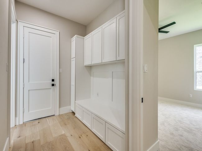 Mudroom featuring baseboards and light wood finished floors | Image 28