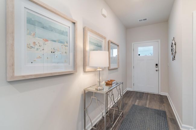 Entryway featuring dark wood-style floors and baseboards | Image 5