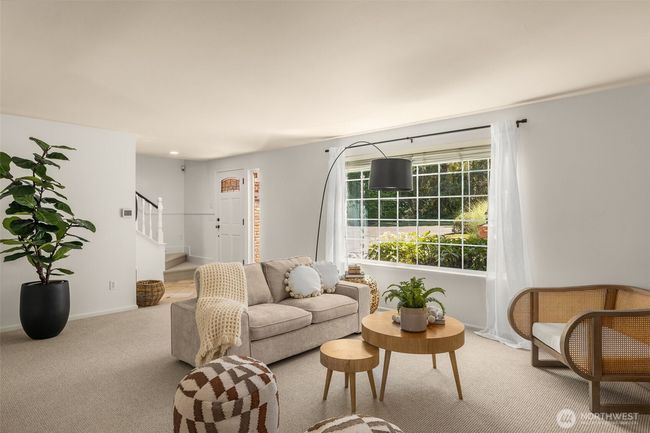 This sun-filled living space made for slow mornings and cozy evenings. | Image 9