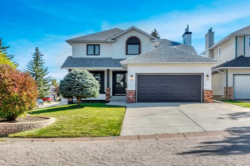238 Hawktree Bay Nw, House with 4 bedrooms, 4 bathrooms and 4 parking in Calgary AB | Card Image