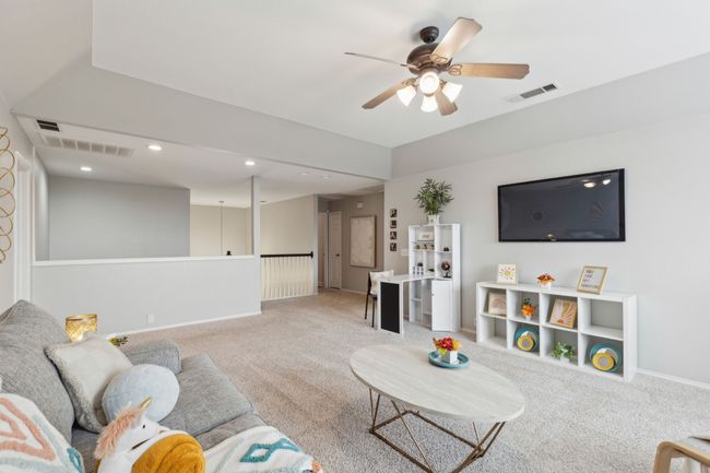 Living area with ceiling fan, carpet floors, baseboards, and recessed lighting | Image 23