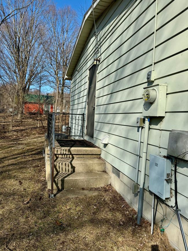 8288 Portage St, House other with 4 bedrooms, 3 bathrooms and null parking in Onekama MI | Image 39
