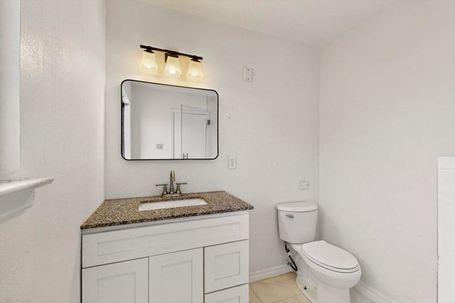 Bathroom featuring vanity and tile patterned flooring | Image 22