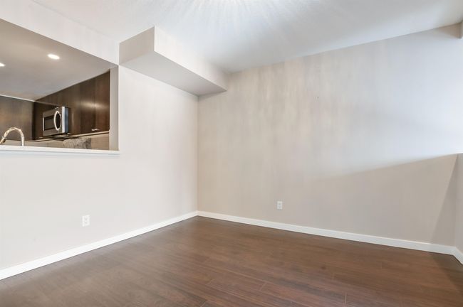 Bonus room with dark wood-style floors and recessed lighting | Image 8