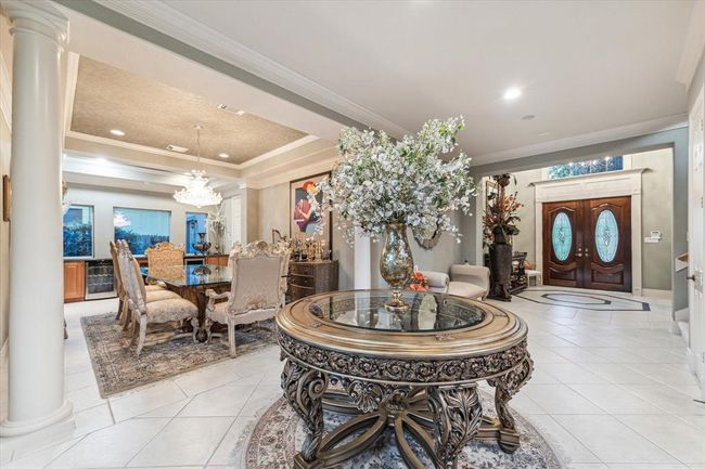 Heading back to the front of the home, the grand entry leaves an immediate first impression. | Image 21