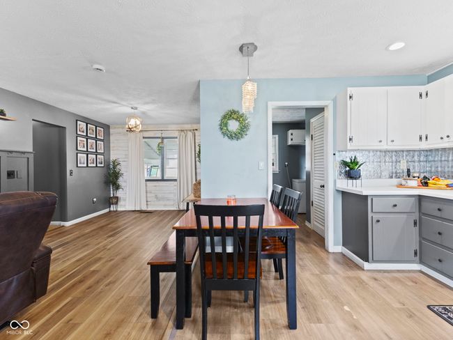 dining room with light wood finished floors and baseboards | Image 13