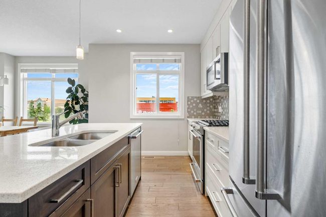 831 85 St Sw, Home with 4 bedrooms, 3 bathrooms and 2 parking in Calgary AB | Image 6