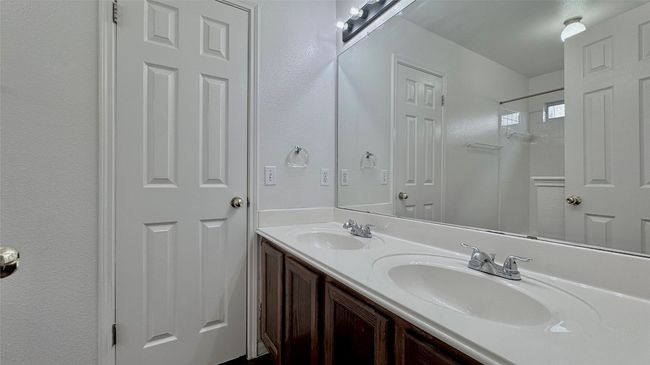 Primary bathroom with double vanity and a shower/tub combo | Image 10