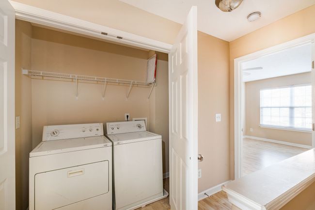 Laundry in-between both suites | Image 24