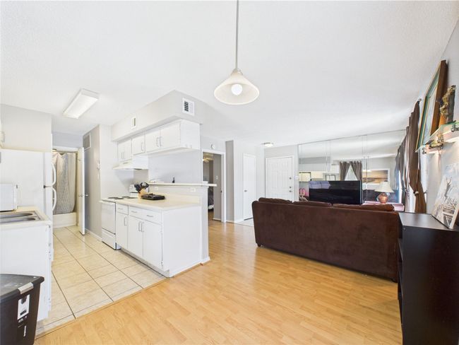 View from Dining into Kitchen & Living Area | Image 5