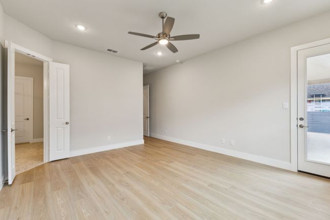 Empty room featuring a ceiling fan, light wood-type flooring, and recessed lighting | Image 17