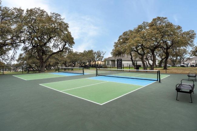 View of tennis court with fence | Image 20