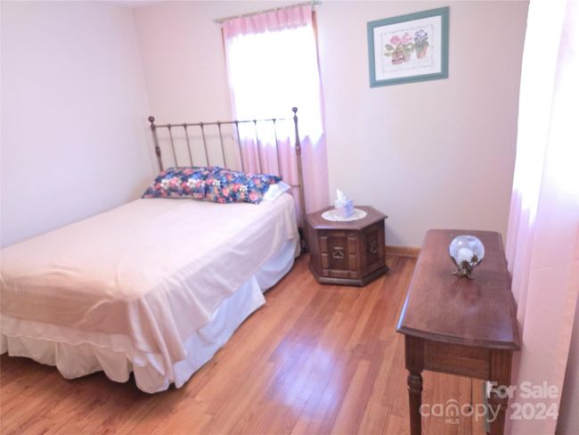 Bedroom 3 has it's own half bath | Image 14