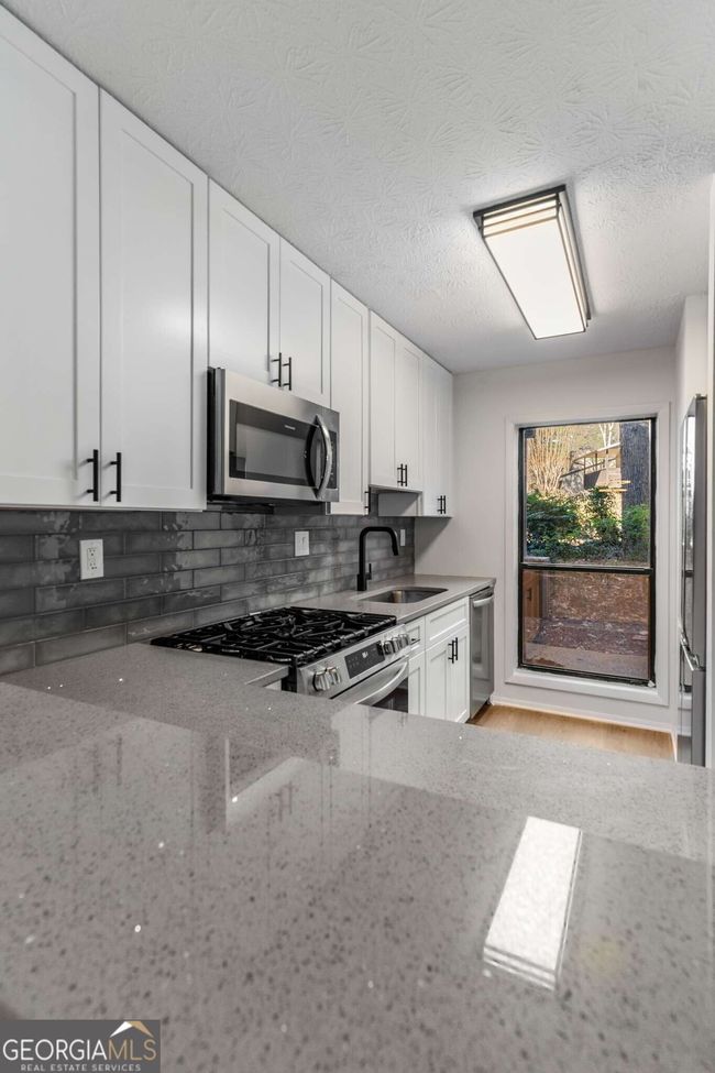 1003 Cumberland Ct Se, Condo with 2 bedrooms, 1 bathrooms and 2 parking in Smyrna GA | Image 12