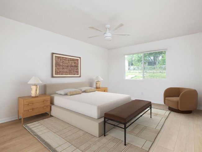 Bedroom featuring baseboards, light wood-type flooring, and ceiling fan | Image 22