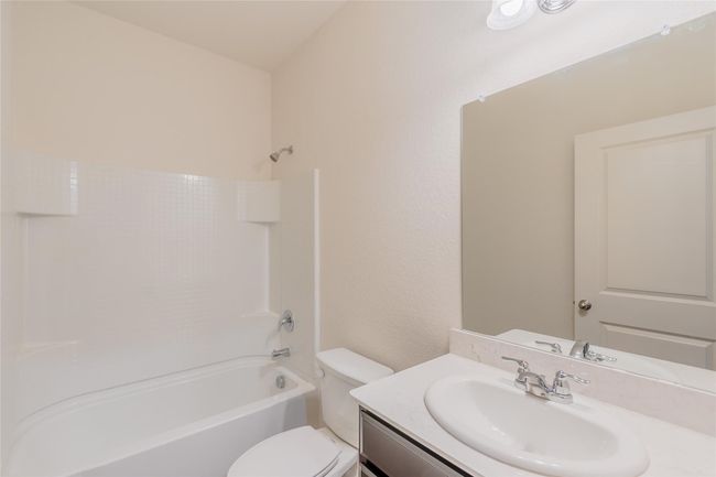 Full bath with vanity, toilet, and shower / bathtub combination | Image 4