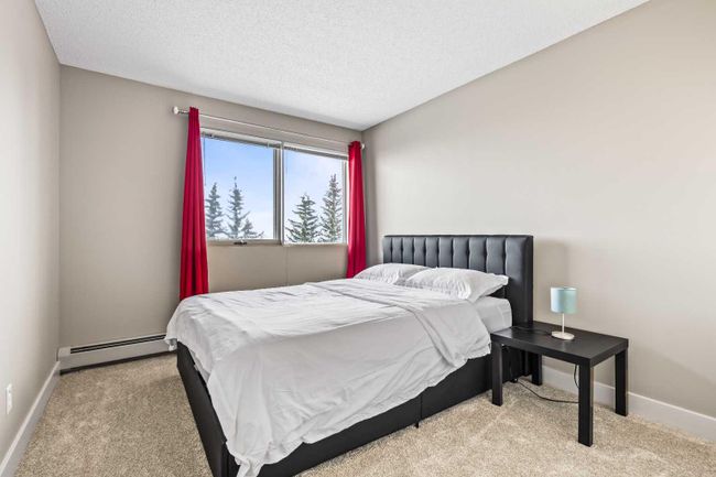 8 - 122 Village Heights Sw, Home with 2 bedrooms, 1 bathrooms and 2 parking in Calgary AB | Image 13