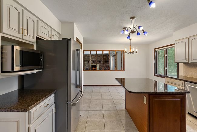 Center Island with room for entertaining. | Image 11