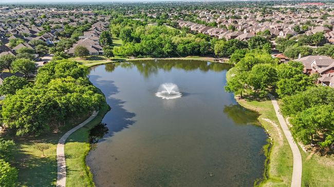 Aerial perspective of suburban area with a large body of water | Image 40