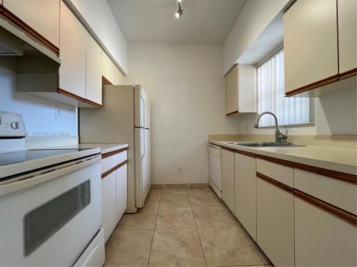 a20-661 Cypress Lake Blvd, Deerfield Beach, FL, 33064-5090 | Card Image