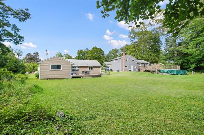 View of yard with a deck | Image 31
