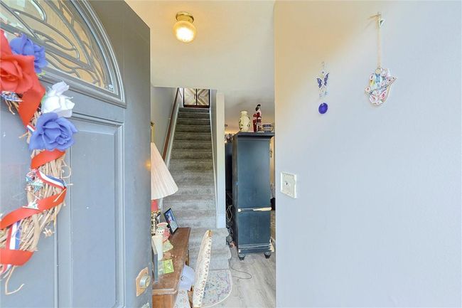 Entryway with hardwood / wood-style floors | Image 30