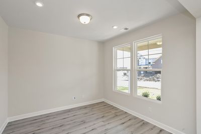 First floor study off of entry. Photos are of similar home, same plan. | Image 3