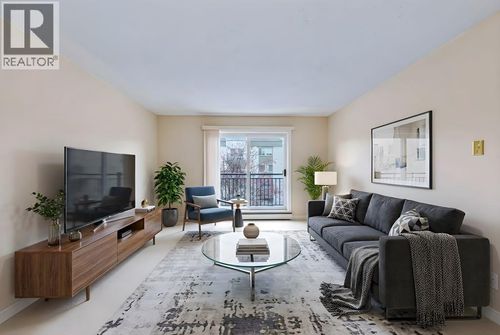 723 57 Ave Sw, Calgary, AB, T2V4Z3 | Card Image