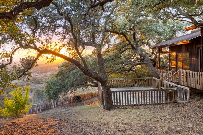 View of yard featuring a deck | Image 11