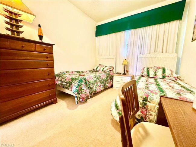 Bedroom with carpet | Image 25