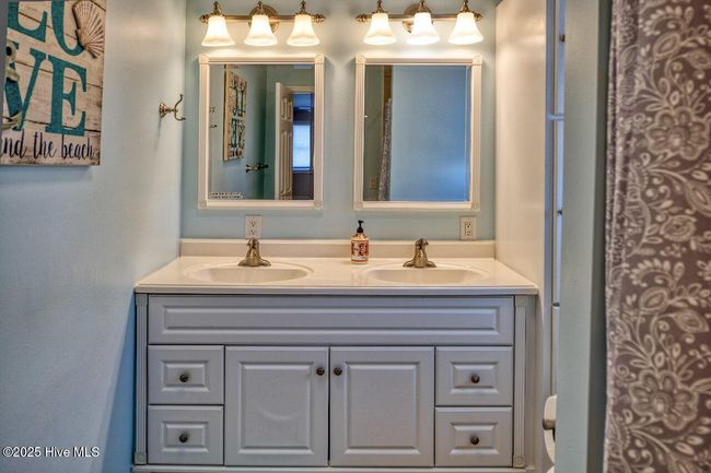 Bedroom 2 full Bathroom with double vanity sink | Image 13