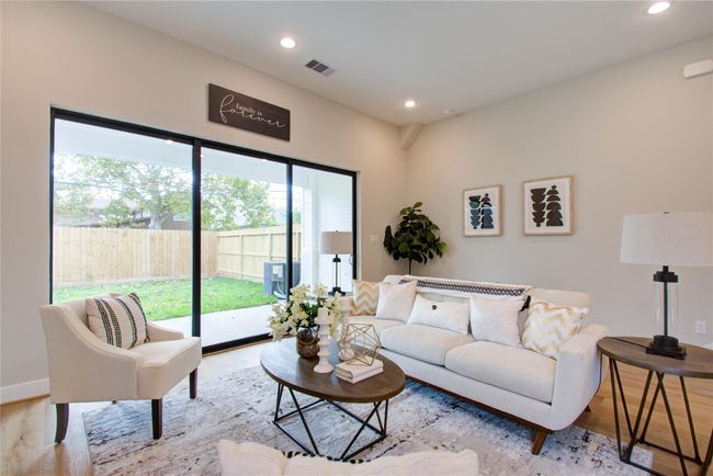 Living area with sliding glass doors into the backyard! | Image 23
